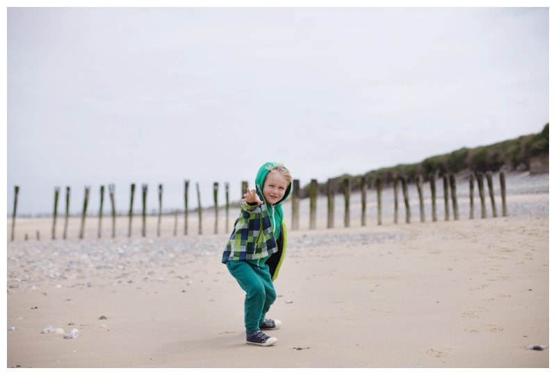 running on a windy beach in france