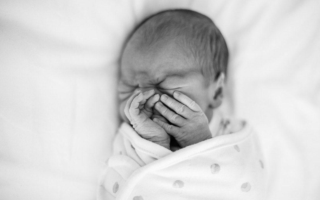 How to choose the right newborn photographer for you