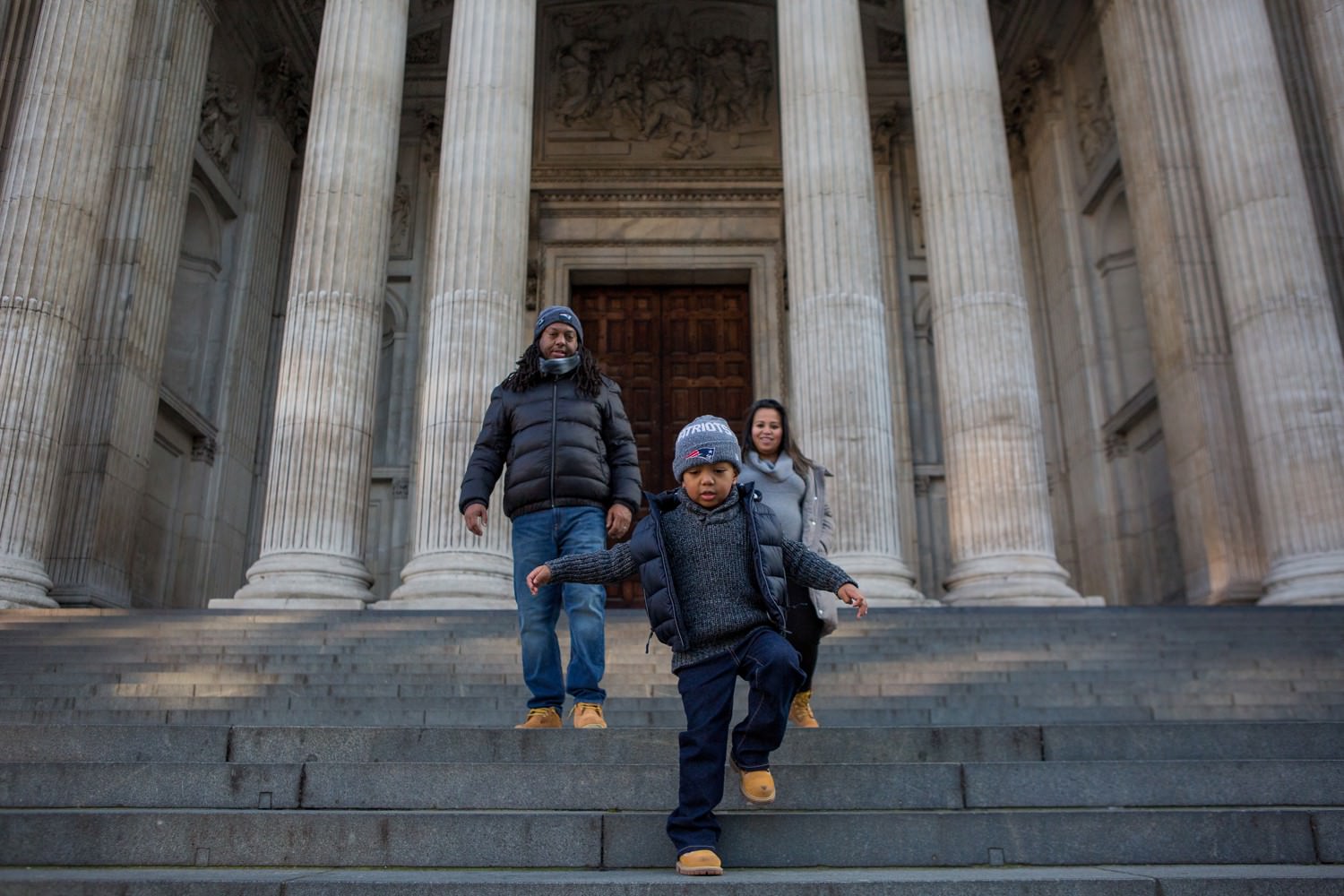 family exploring St Paul's Cathedral in London